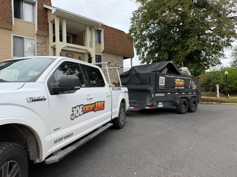Truck and trailer at an apartment cleanout
