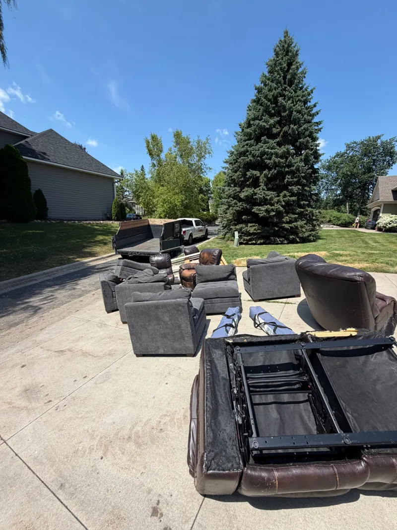 Old sectional couches waiting for pickup