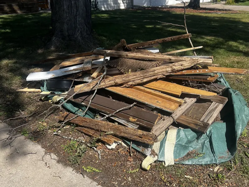 A pile of scrap wood and debris ready for pickup