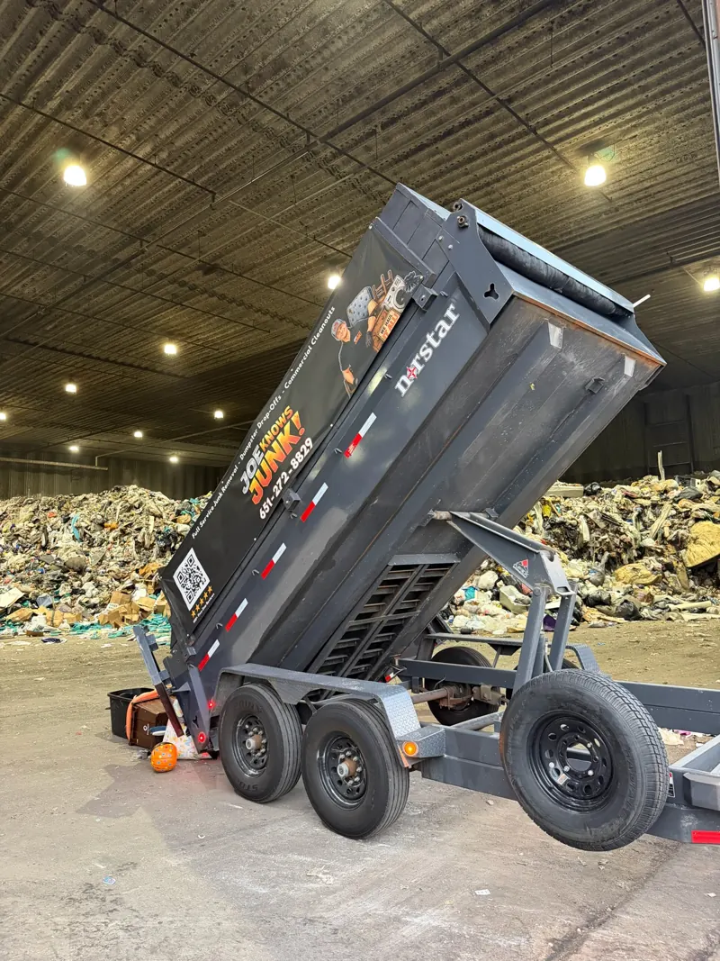 Trailer dumping a load at the transfer station